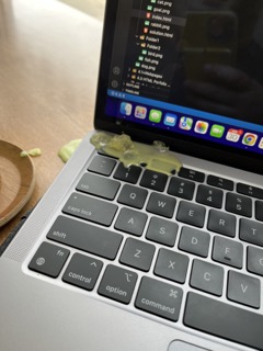 Juliet's spilled matcha on the corner of her laptop